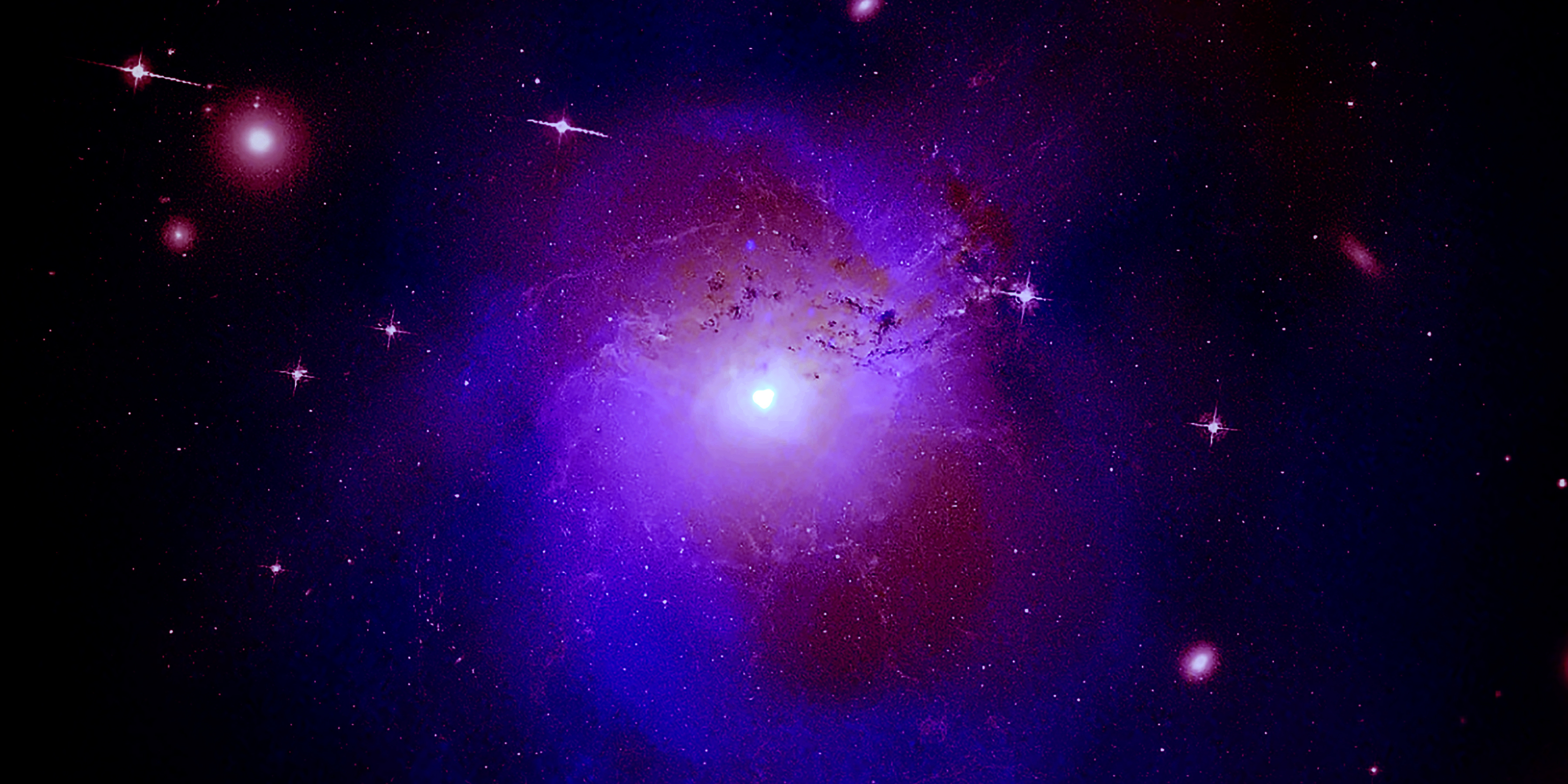 Composite image of the Perseus galaxy cluster using data from NASA’s Chandra X-ray Observatory, ESA’s XMM-Newton and Hitomi, a Japanese-led X-ray telescope. Credits: X-ray: NASA/CXO/Fabian et al.; Radio: Gendron-Marsolais et al.; NRAO/AUI/NSF Optical: NASA, SDSS