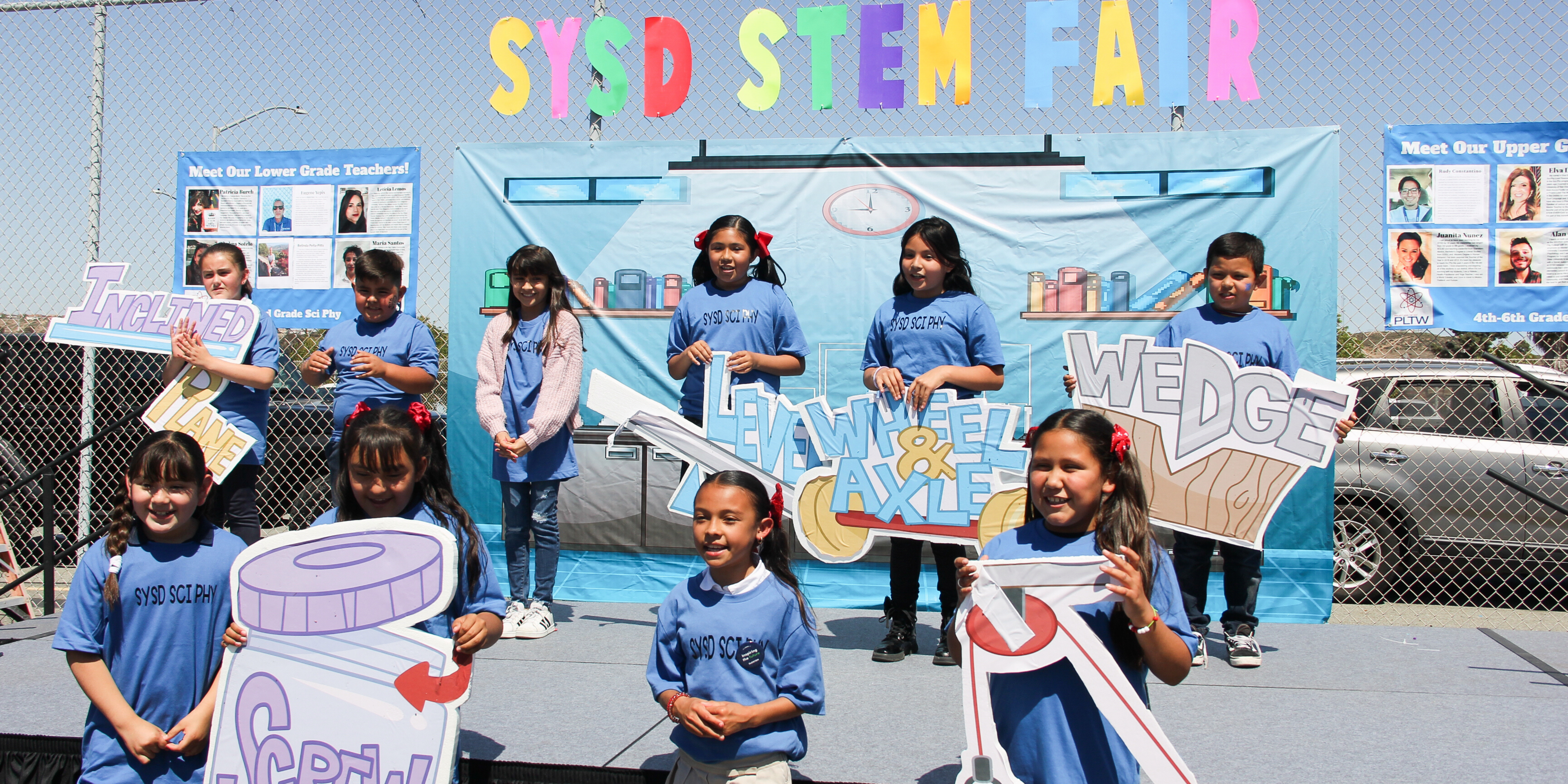 Children participating in an outdoor educational activity on a sunny day