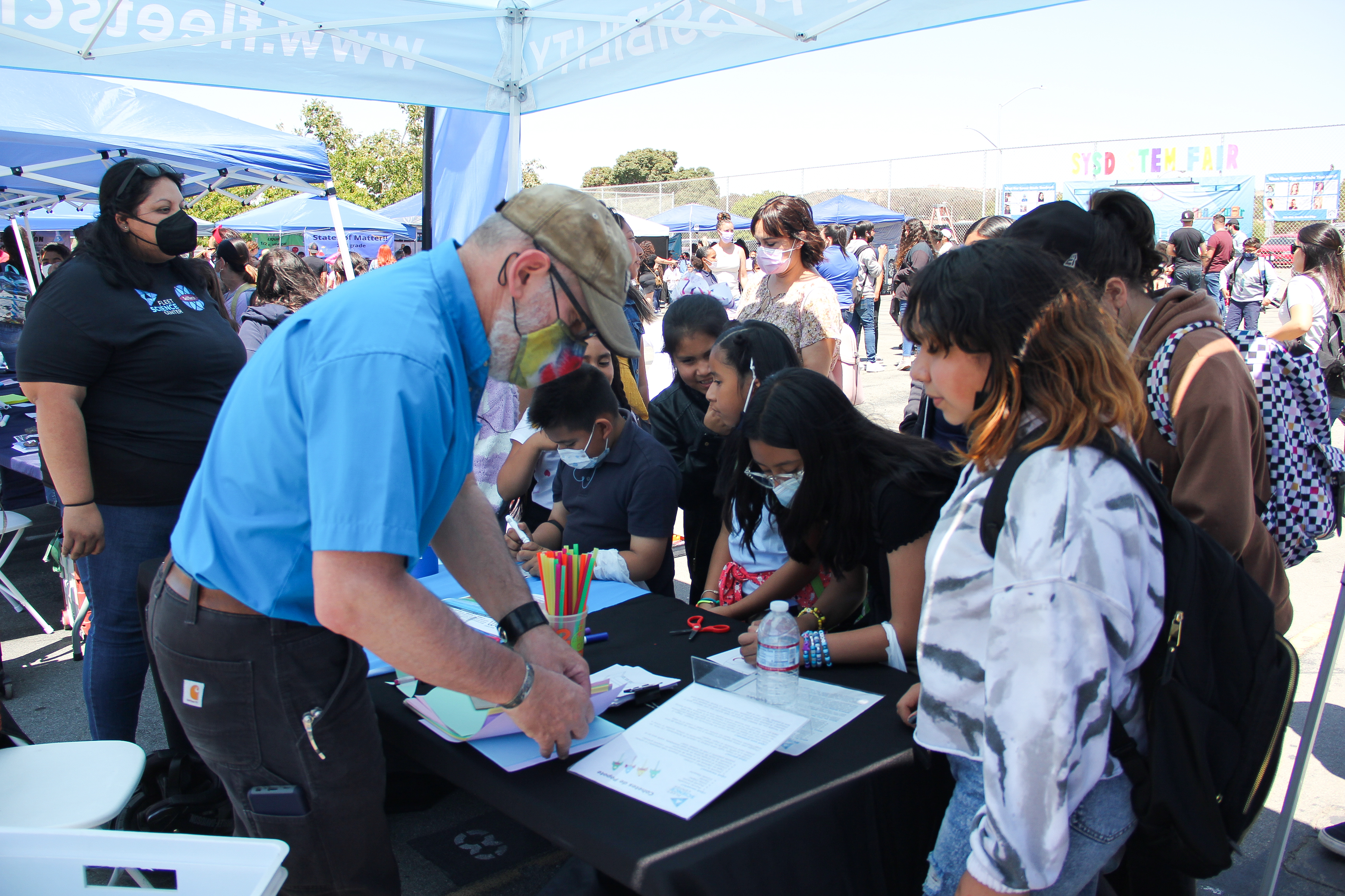 Students engaging in activities on a sunny day