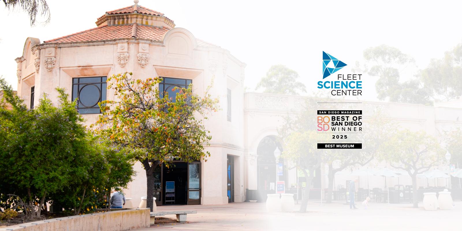 Fleet Science Center building in cream color with trees around. The Fleet and Best Of logo are on the right corner. 