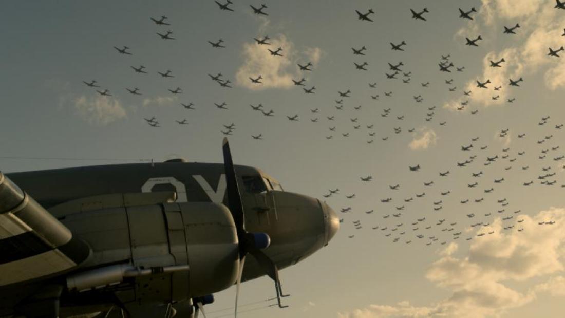 A WWII plane in the foreground with hundreds of planes flying in formation above.