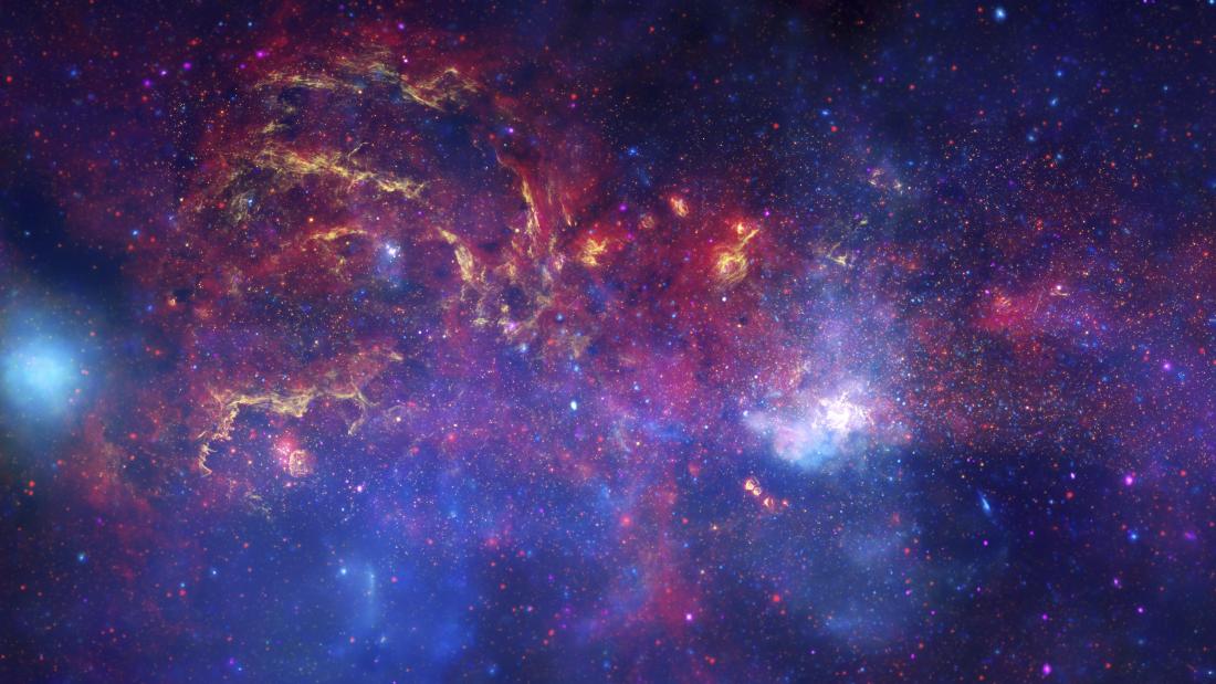 A long image of the milk way galaxy in purple and red lights