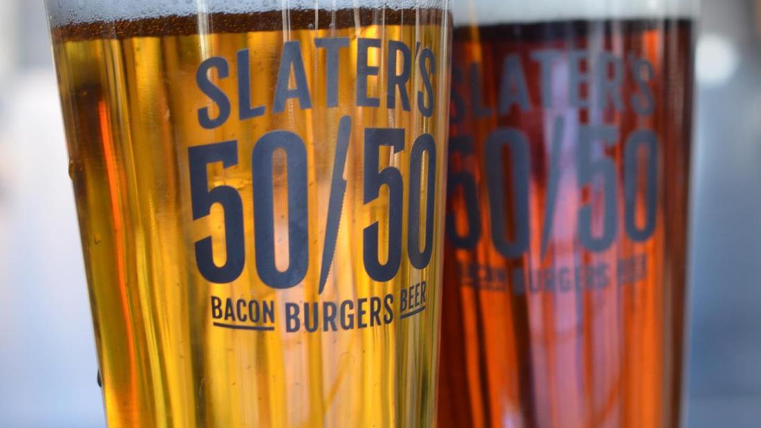 two pint glasses full of beer