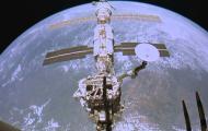 The international space station floating above the earth against a black sky