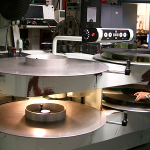 Mike Lawrence, IMAX projectionist, handles the IMAX film in the projection room at the Fleet Science Center