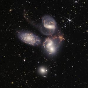 In an enormous new image, NASA’s James Webb Space Telescope reveals never-before-seen details of galaxy group “Stephan’s Quintet”. The close proximity of Stephan’s Quintet gives astronomers a ringside seat to galactic mergers, interactions.