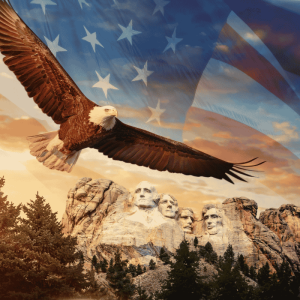 eagle flying with mount rushmore in the background set upon the backdrop of an american flag